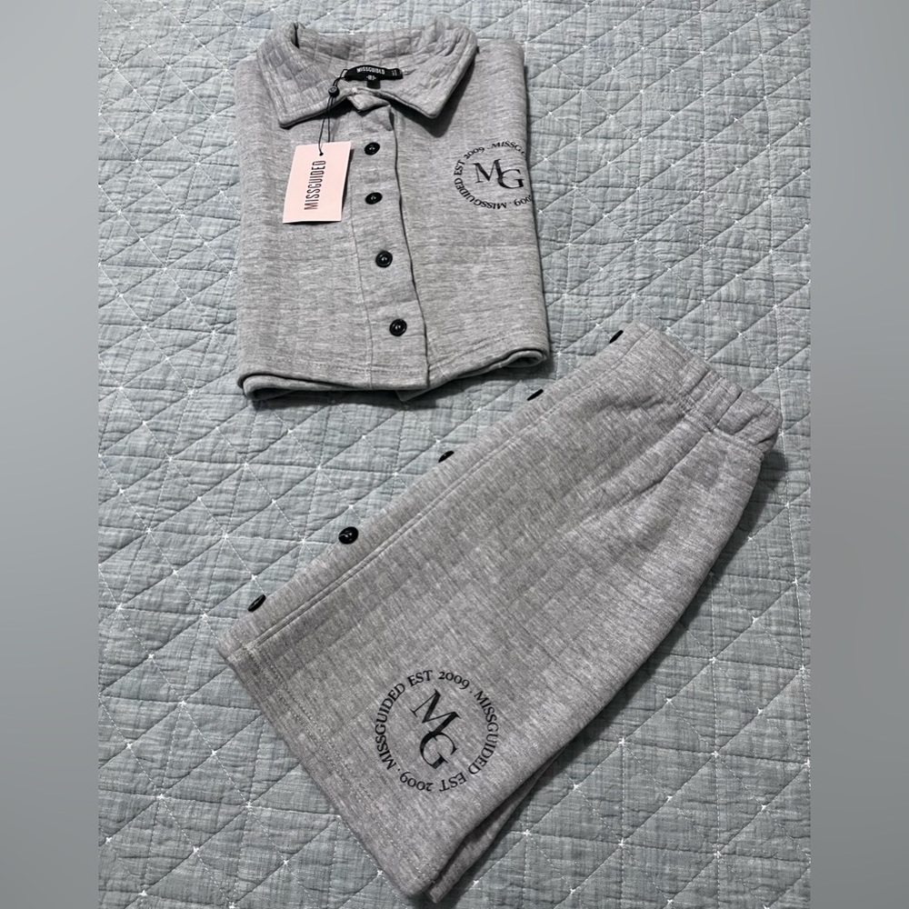 MISGUIDED QUILTED POLO SHIRT AND SKIRT
BRANDED SET
GREY SIZE 2